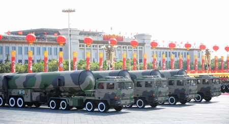 Weapons and equipment are displayed in parade