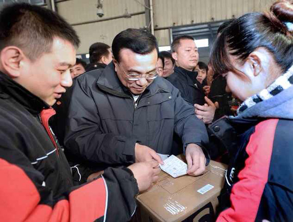 Go global, Premier Li tells domestic courier