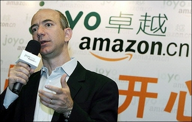 The founder and CEO of Amazon, Jeff Bezos talks to the press during a news conference in Shanghai. US online seller Amazon said Thursday it will increase its investment in Joyo.com, one of China's leading online shopping websites.(AFP