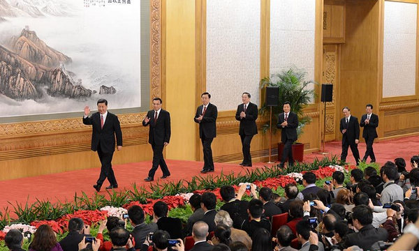 Xi leads top leadership to meet press