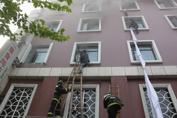 Central China hotel fire kills 11