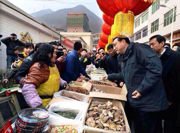 Li visits isolated county in NW China