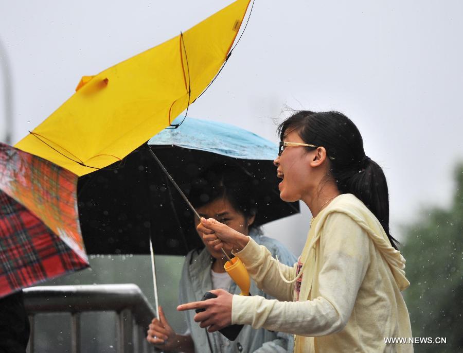 Beijing issues blue warning signal of rainstorm