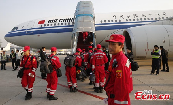 China to aid Nepal after quake, bring stranded tourists home