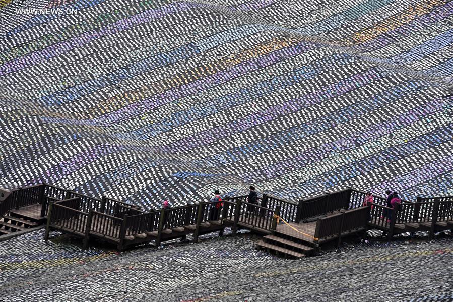 Giant mosaic made of 3m recycled discs in Taiwan