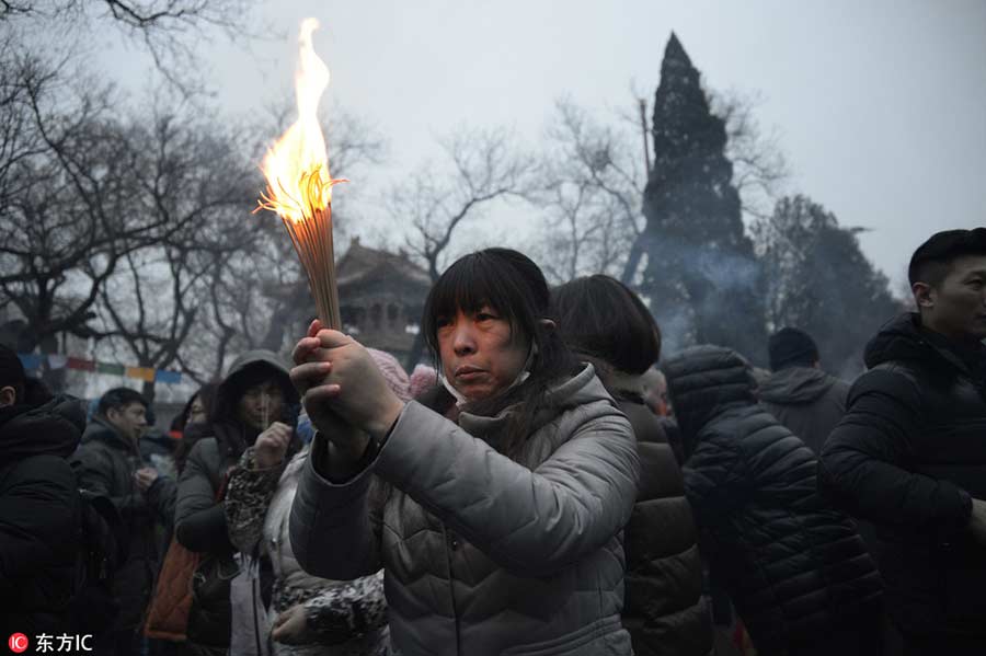 Praying for a fortunate Year of the Rooster