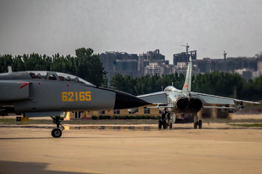 Female pilots fly JH-7 fighter bombers