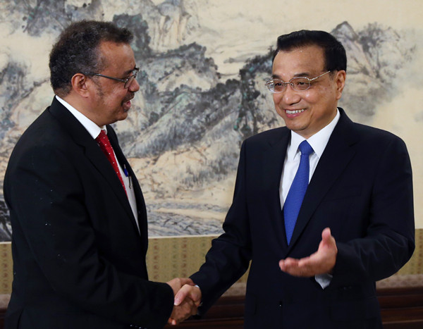 Premier Li welcomes WHO head