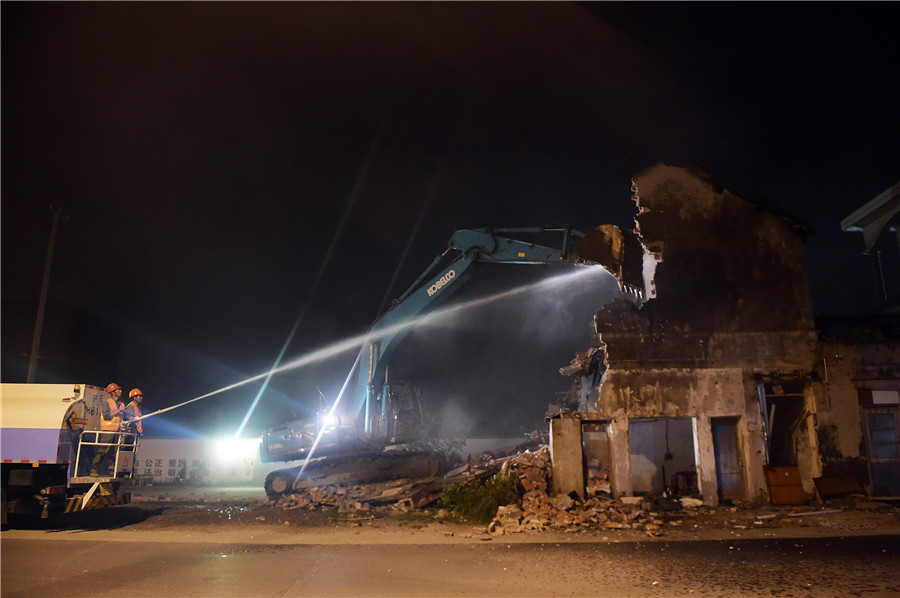 Shanghai house in road torn down after 14-year battle