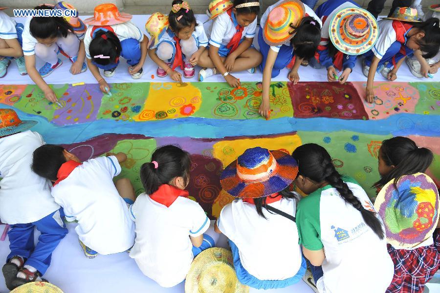 Painting event held to greet upcoming Int'l Children's Day in Beijing