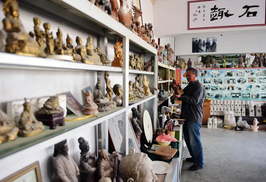 Shishan town develops stone carving as its leading industry in NE China