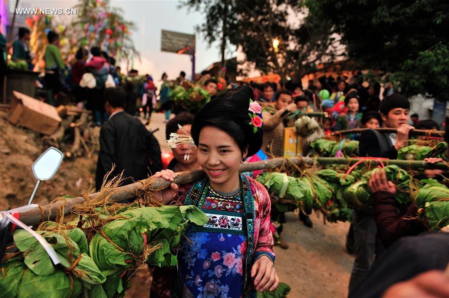 Miao women dress up to celebrate Spring Festival