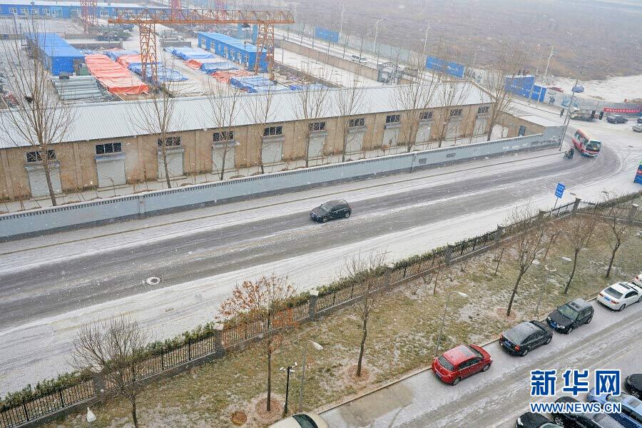 “雪花紛飛看京城”：北京大部地區(qū)迎來降雪