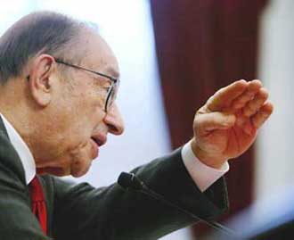 The Federal Reserve raised U.S. interest rates on December 14, 2004 by a quarter-percentage point to 2.25 percent, the fifth increase this year. Fed Chairman Alan Greenspan is shown testifying on Capitol Hill Feb. 25, 2004. [Reuters]