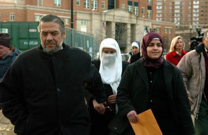 The family of Ahmed Omar Abu Ali, from left, Omar Abu Ali, father, Faten Abu Ali, mother, and Tasneem Abu Ali, sister leave the U.S. District Court in Alexandria, Va., on Tuesday, March 1, 2005. U.S. Magistrate Judge Liam O'Grady ordered Abu Ali, who is accused of plotting with al-Quaida to assassinate President Bush, to remain in jail pending trial. [AP]