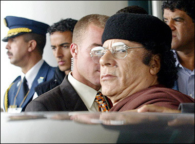 Libyan Leader Moamer Kadhafi Leaves following the closing session of the 17th Arab Summit in Algiers.(AFP/Abdelhak Senna) 