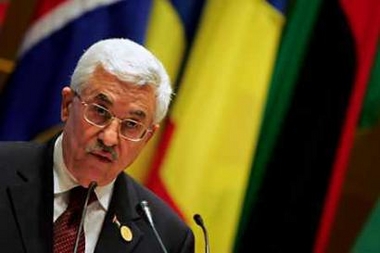 Palestinian President Mahmoud Abbas addresses the Africa Union meeting in Sirte, Libya July 4, 2005. (Radu Sigheti/Reuters)