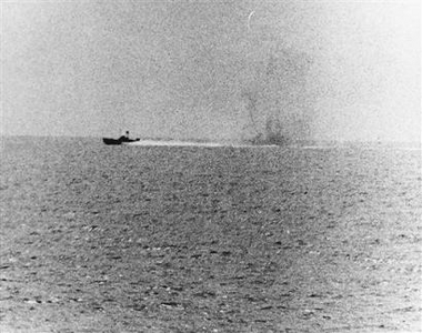 This photo provided by the US Navy shows a North Vietnamese motor torpedo boat attacking the USS Maddox, Aug. 2, 1964 in the Gulf of Tonkin.