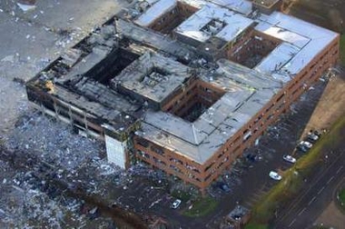 A police handout photograph released on December 13, 2005 shows a wrecked office complex near the Buncefield fuel depot in Hemel Hempstead near London on December 12, 2005.