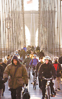 New York commuters trudged through the freezing cold, rode bicycles and shared cabs Tuesday as New York's bus and subway workers went on strike for the first time in more than 25 years and stranded millions of riders at the height of the Christmas rush. A judge slapped the union with a $1 million-a-day fine. 