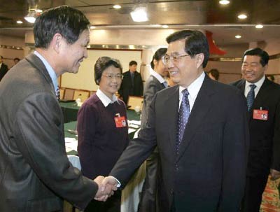 Leaders attend NPC preparatory meeting, join CPPCC group discussions