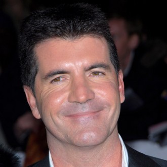 Simon Cowell wants water wedding