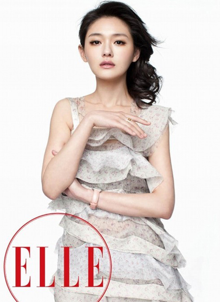 Barbie Hsu and Huang Xiaoming taking shots for ELLE