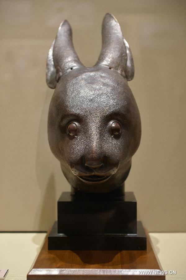 Rat, rabbit head sculptures on display