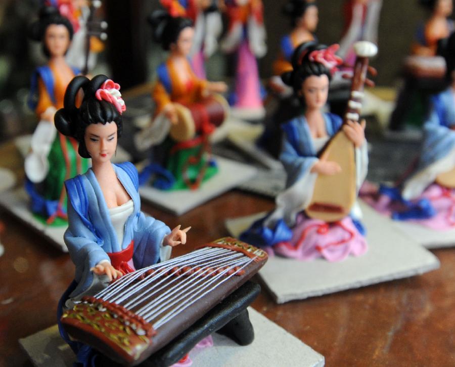 Folk artist makes pretty dough figurines