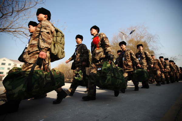 New recruits march off to a new life