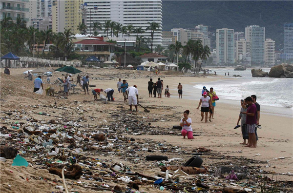 Tropical storms lash Mexico