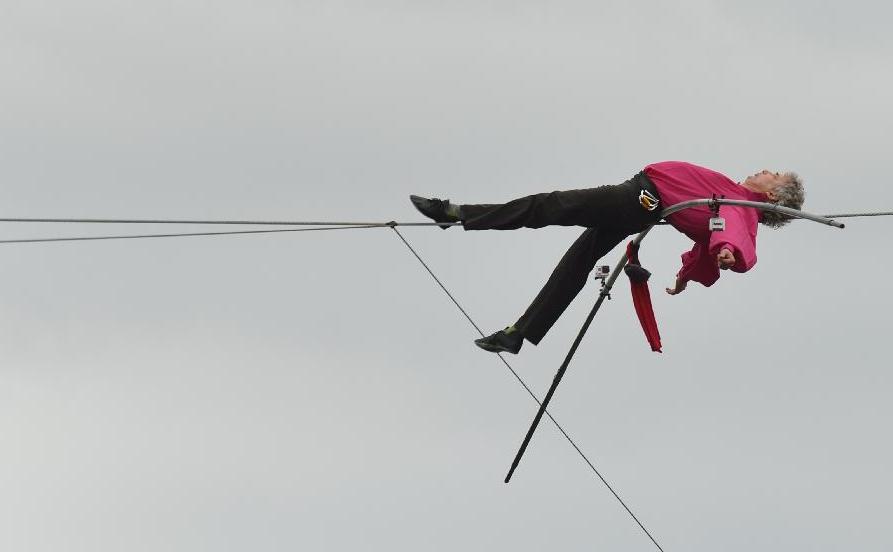 Tightrope walker completes walk over Seine river in Paris