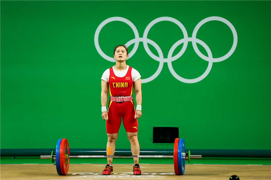 Weightlifter Deng Wei breaks world records