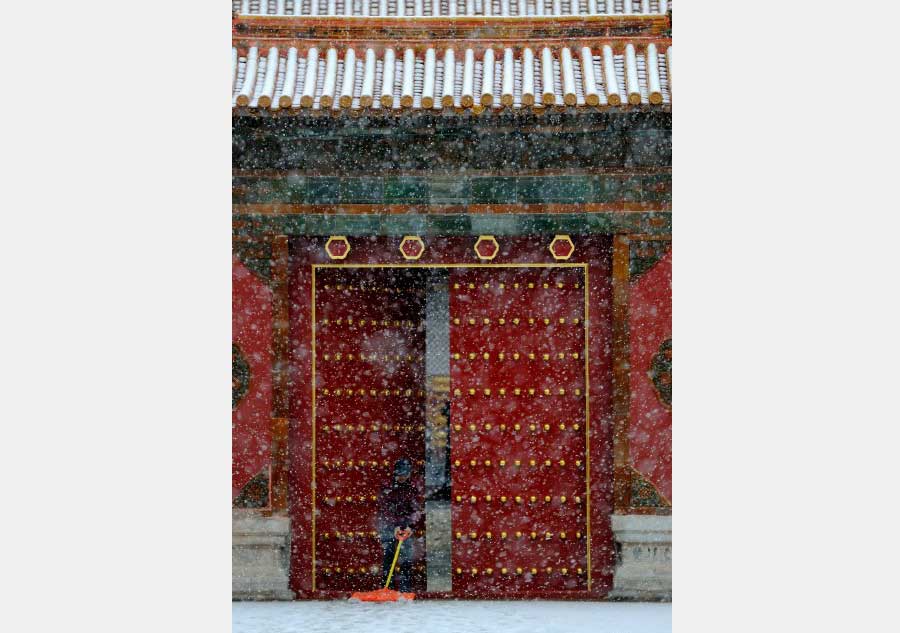 Palace Museum coated in snowfall, a poetic twist to the attraction