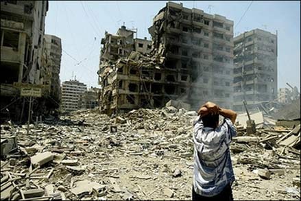 A large plume of smoke billows in the town of Khiam, in southern Lebanon, Tuesday, July 25, 2006, after Israeli air raids targeted it. An Israeli air raid on south Lebanon killed as many as four UN observers, overshadowing an international crisis meeting due to open in Rome, as Hezbollah vowed to fire rockets further into the heart of Israel.[AP Photo]