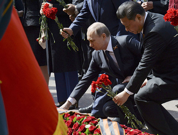 Xi attends Russia's V-Day parade, marking shared victory with Putin