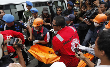 Officials: 9 dead, 50 wounded in Indonesian blasts