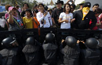 Thai police arrest protest leader, retake rally site