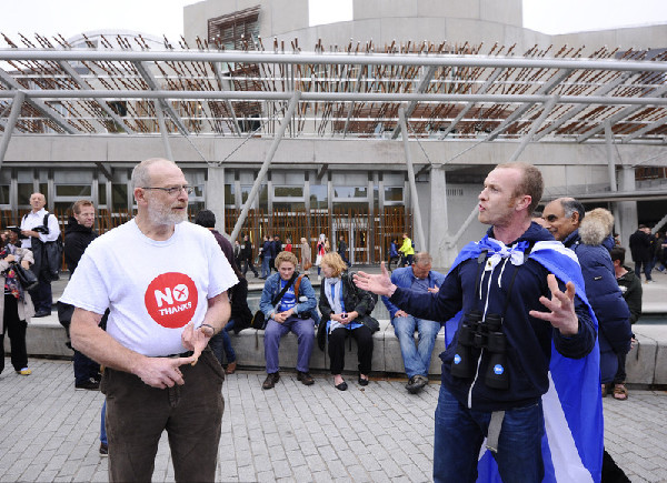 Scots vote in record numbers, await independence verdict