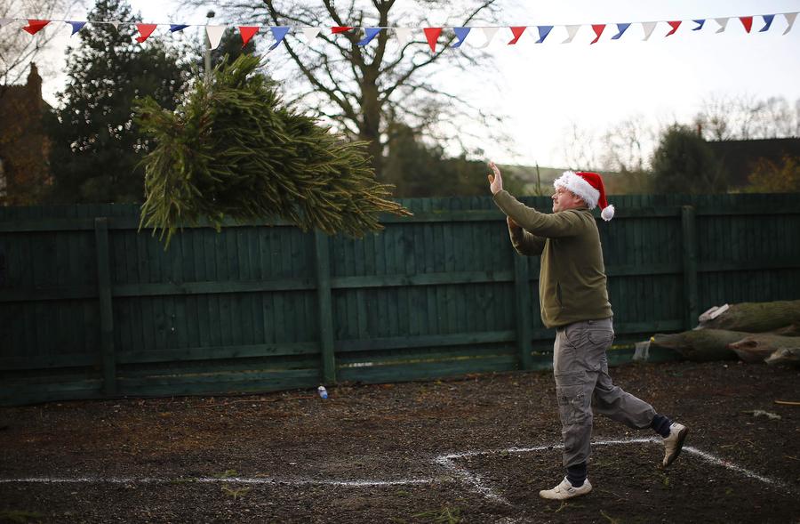 Christmas Tree Throwing Championships held in UK