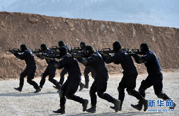 Riot police hone skills before heading for peacekeeping mission