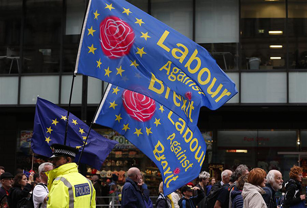 50,000 protesters gather in Manchester as May's Conservatives start their conference